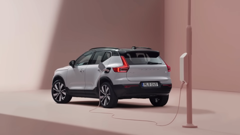 The Image Shows an Electric Car Being Charged